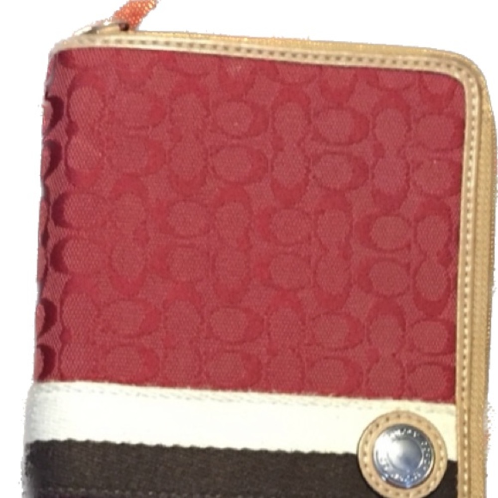 Coach extra large zippered wallet.
